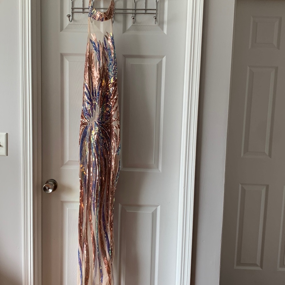 Style Sapphire- fancy, formal, long  dress with open back and side high slit.